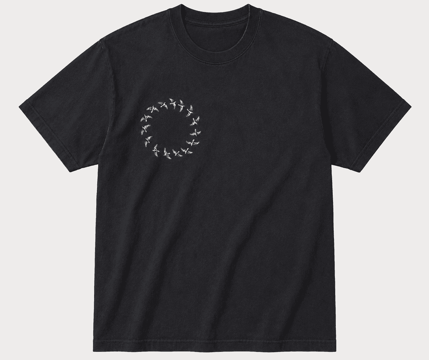 Front of the tee: a small ring of birds circling at the chest